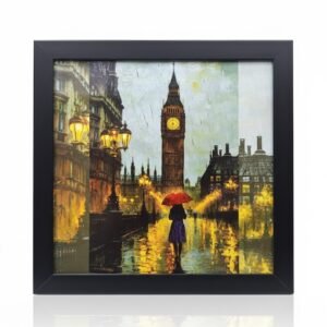 Framed London rainy night wall art print of Big Ben, with warm golden streetlights reflecting on the wet pavement, and a figure holding a red umbrella.